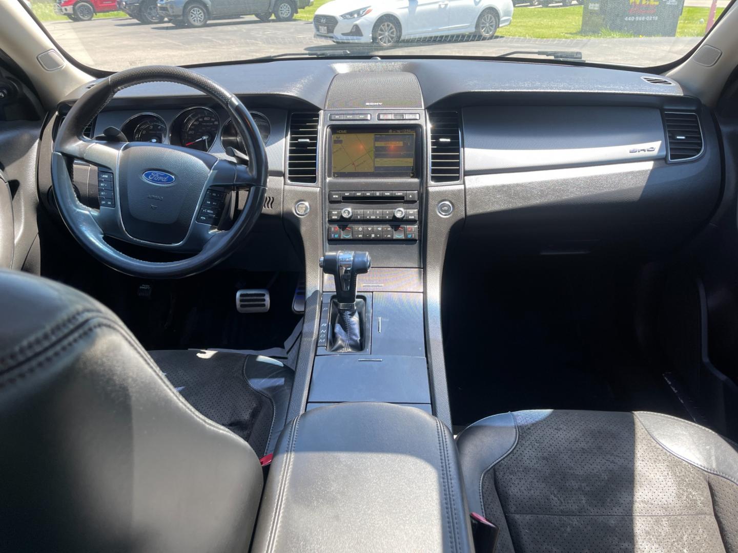 2010 White /Black Ford Taurus SHO (1FAHP2KT3AG) with an 3.5L V6 DOHC 24V TWIN TURBO engine, 6-Speed Automatic transmission, located at 11115 Chardon Rd. , Chardon, OH, 44024, (440) 214-9705, 41.580246, -81.241943 - This 2010 Ford Taurus SHO AWD is a high-performance variant of the Taurus sedan, powered by a potent 3.5L EcoBoost V6 engine that produces 365 hp and enables a 0-60 mph time of 5.2 seconds. It features an advanced AWD system, a 6-speed automatic transmission, and the SHO Performance Package. Notable - Photo#37